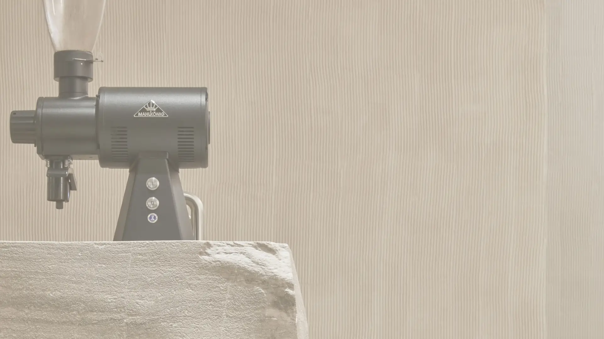 Close-up of the espresso grinder at the Orijins bar